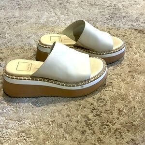 Platform sandals.  Dolce Vita, super comfy, cream color platform slides.